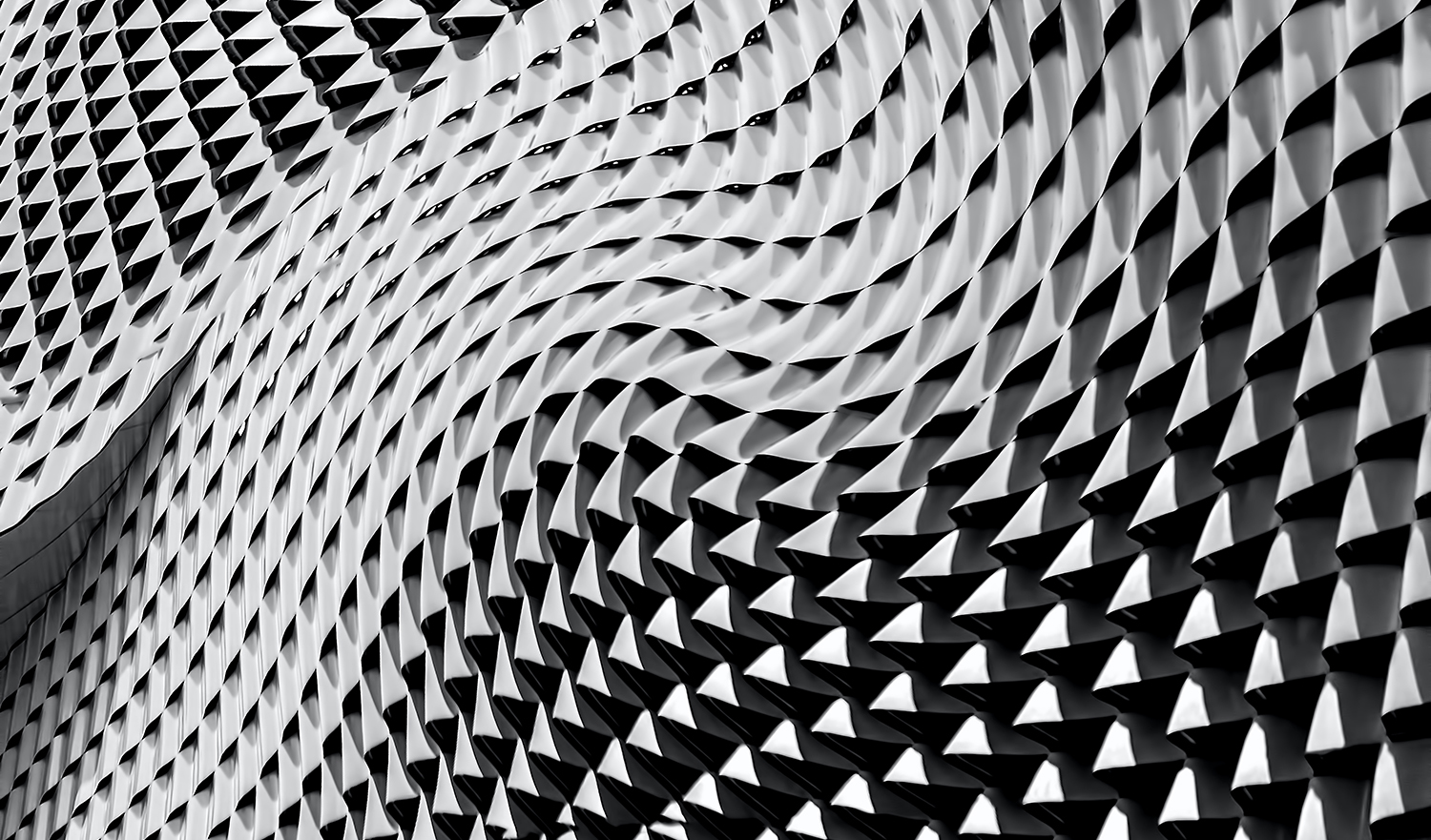 Geometric grey swirling pattern