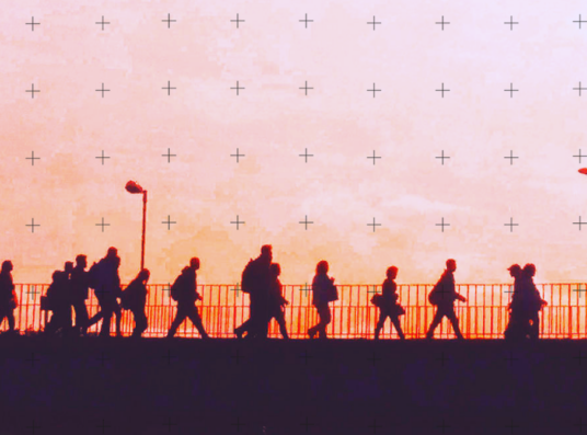 People walking in sunset.